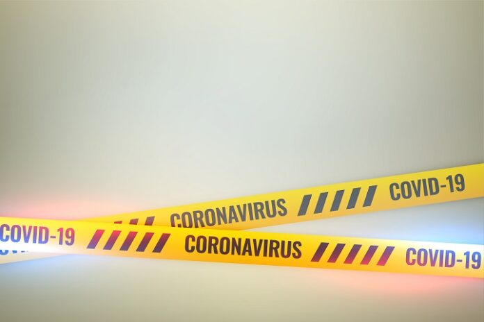 coronavirus covid-19 do not cross yellow tape background